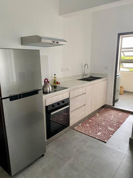 Sandstone Apartment A Walk To The Beach Flic en Flac Экстерьер фото